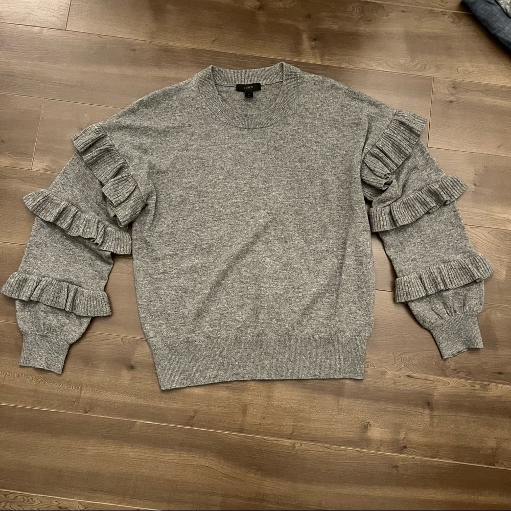 Like new gray wool crew neck long sleeve sweater with ruffled sleeves